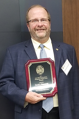 WCC history instructor Dr. David Fitzpatrick with his 2017 Army Historical Foundation Distinguished Writing Award
